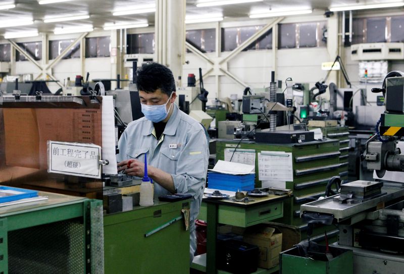 &copy; Reuters. FILE PHOTO: A worker is seen at the factory of Nagumo Seisakusho Co., Ltd. in Jyoetsu