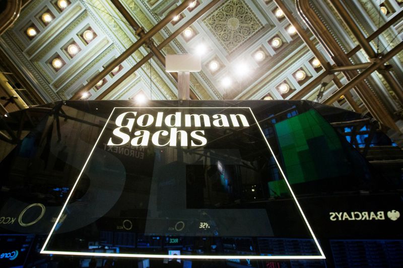 © Reuters. FILE PHOTO: Goldman Sachs sign is seen above floor of the New York Stock Exchange shortly after the opening bell in the Manhattan borough of New York