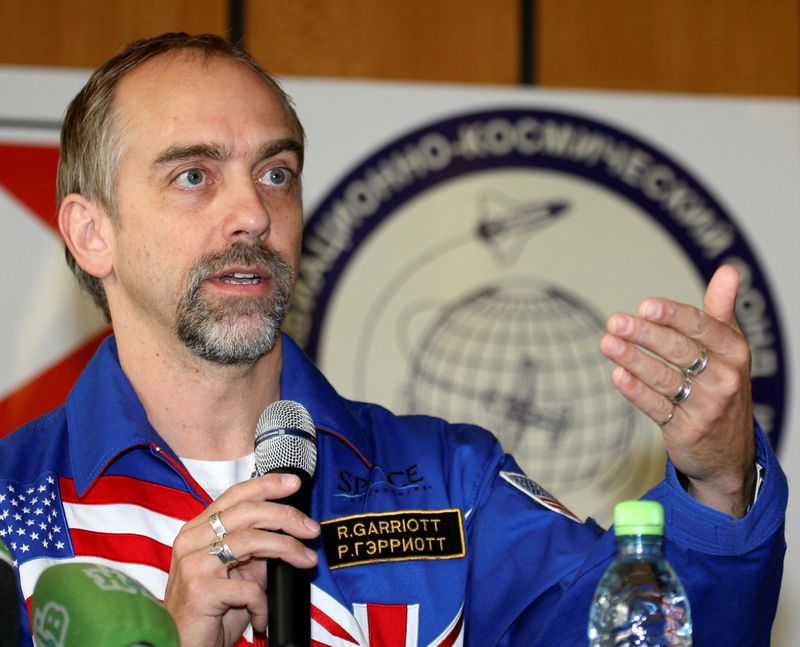 &copy; Reuters. FILE PHOTO: U.S. space tourist Garriott speaks during a news conference at Star City outside Moscow