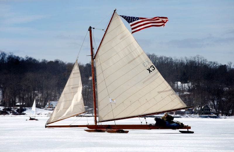 &copy; Reuters. FILE PHOTO: Antique ice sailboats from the Hudson River Ice Yacht Club&apos;s sail on the frozen upper Hudson River near, Astor Point in Barrytown, New York