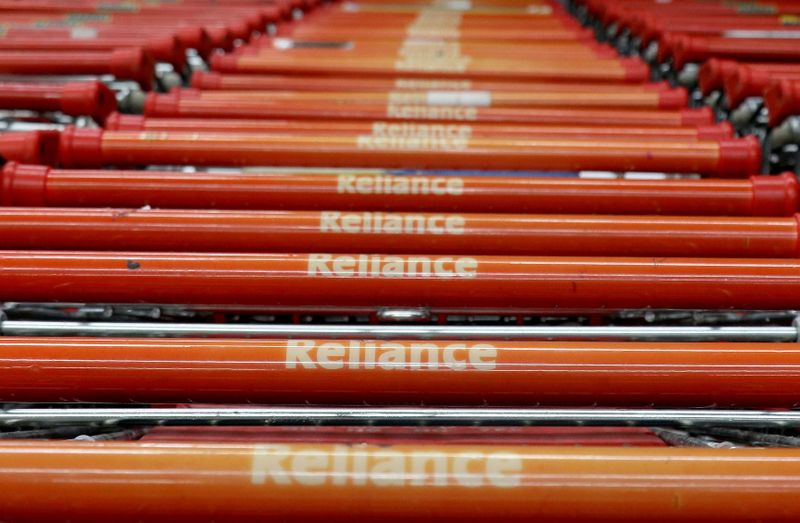 &copy; Reuters. Shopping trolleys are parked outside a Reliance supermarket in Mumbai
