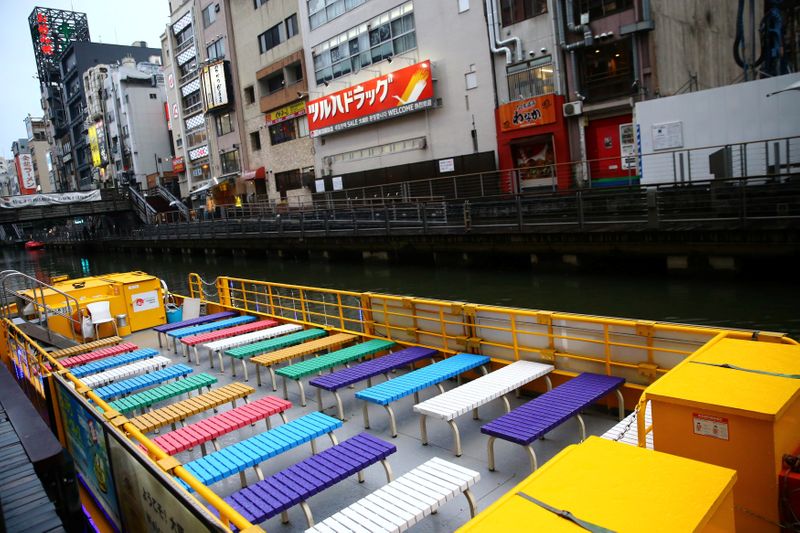 &copy; Reuters. A ship is pictured on an almost empty port in the Dotonbori amusement district of Osaka
