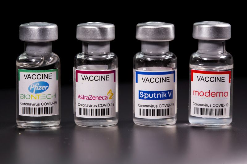 &copy; Reuters. FILE PHOTO: Picture illustration of vials with Pfizer-BioNTech, AstraZeneca, Sputnik V, and Moderna coronavirus disease (COVID-19) vaccine labels