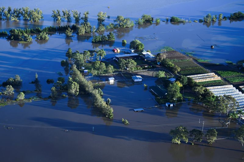 &copy; Reuters. Flood affected areas are seen from a helicopter in the Windsor area near Sydney