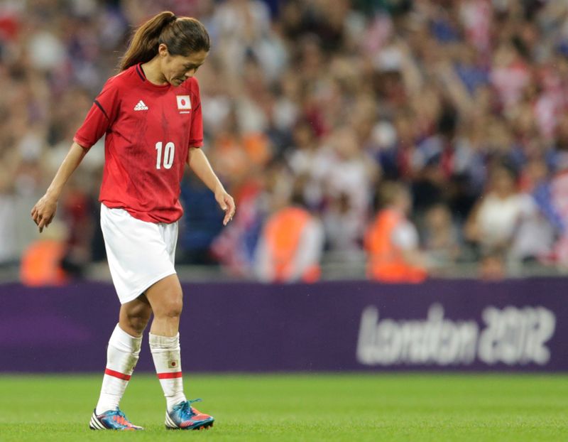 &copy; Reuters. Japan&apos;s Sawa leaves the pitch after their defeat by the U.S. team after the women&apos;s final soccer match at the London 2012 Olympic Games in London