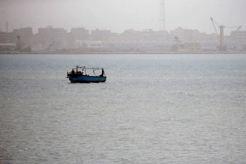 Giant container ship stuck in Suez Canal partially refloated, port agent says