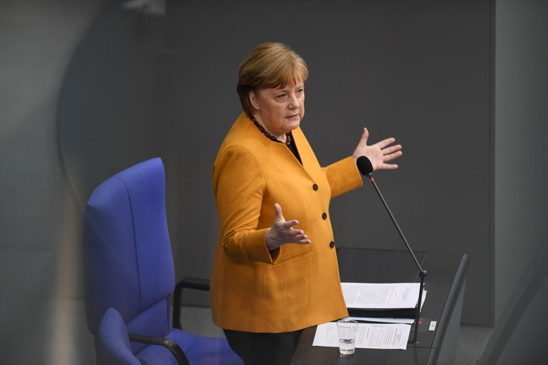 &copy; Reuters. German Chancellor Merkel attends a plenum session of the lower house of parliament, in Berlin