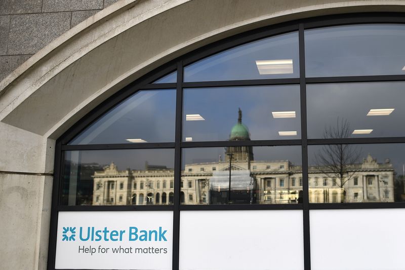 &copy; Reuters. The Customs House is reflected in the window of the Ulster Bank