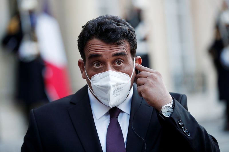 &copy; Reuters. FILE PHOTO: Mohamed al-Menfi, Head of the Presidential Council of Libya, talks to the press after a meeting with the French President at the Elysee Palace in Paris