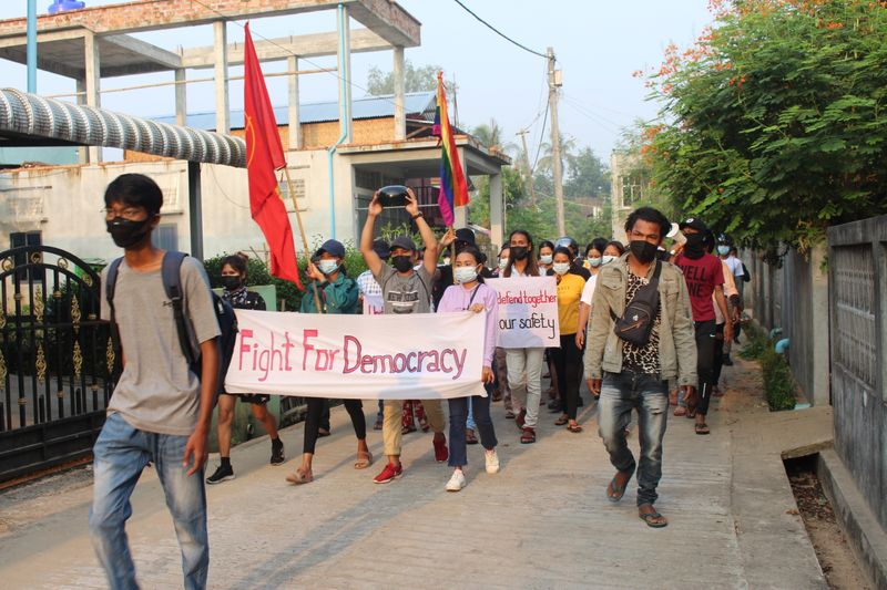 &copy; Reuters. University students and LGBT groups march against coup in Dewai