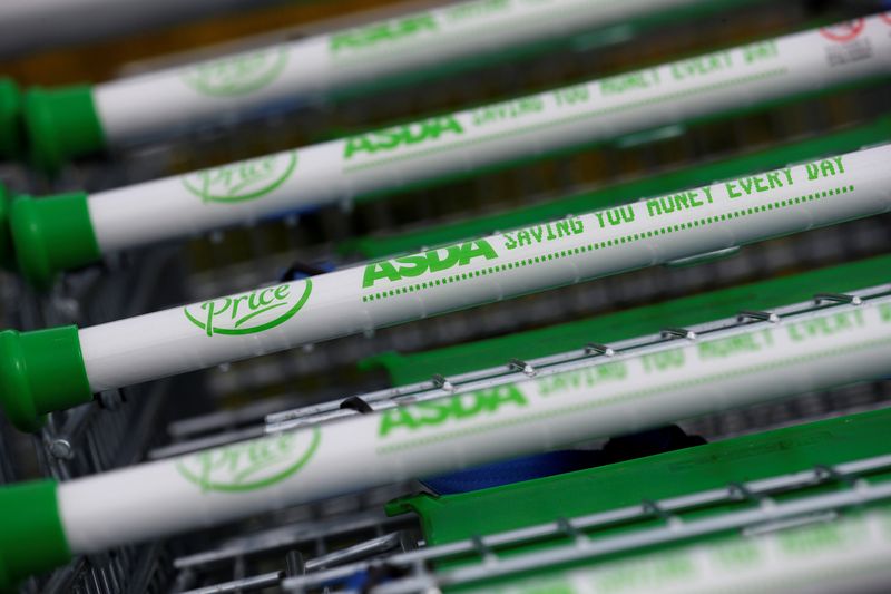 &copy; Reuters. FILE PHOTO: Shopping trolleys outside an Asda supermarket in Altrincham