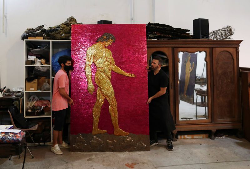 &copy; Reuters. Argentine artist Marcelo Toledo works on art pieces for the &quot;Museum of the After&quot; at his workshop in Buenos Aires, Argentina