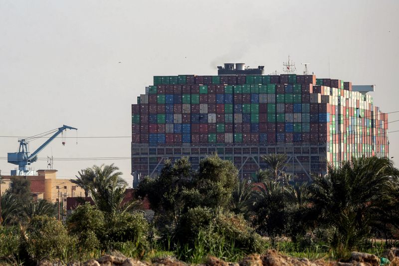 &copy; Reuters. FILE PHOTO: Stranded container ship Ever Given, one of the world&apos;s largest container ships, is seen after it ran aground, in Suez Canal