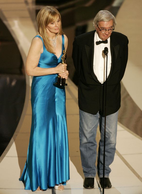 &copy; Reuters. Writers Ossana and McMurtry accept the Oscar for best adapted screenplay for Brokeback Mountain at the 78th annual Academy Awards in Hollywood