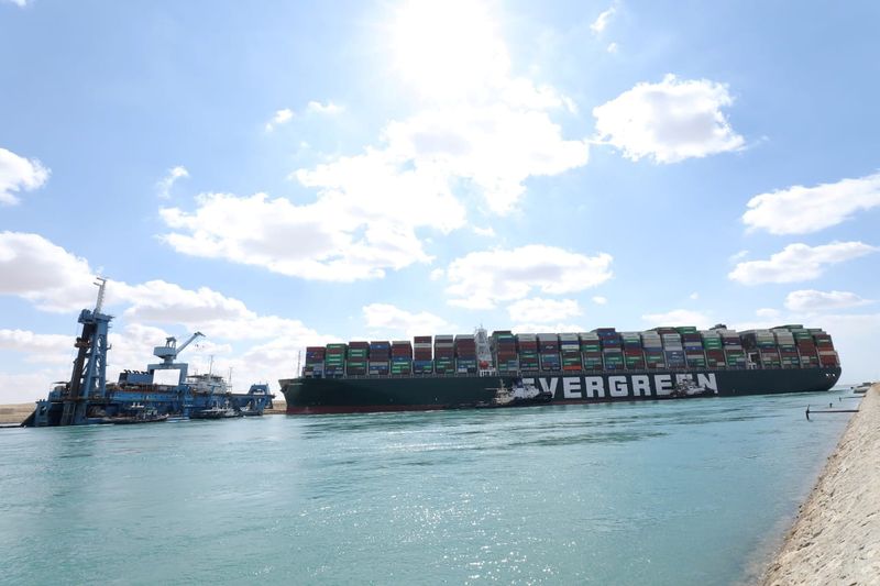 &copy; Reuters. FILE PHOTO: Stranded container ship Ever Given, one of the world&apos;s largest container ships, is seen after it ran aground, in Suez Canal