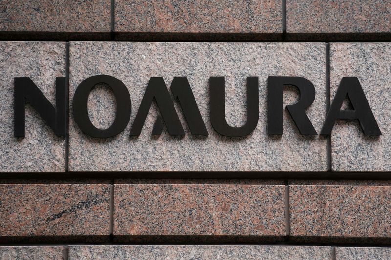 © Reuters. FILE PHOTO: A Nomura logo is pictured at the Japanese company's office in the Manhattan borough of New York City
