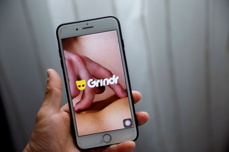 &copy; Reuters. FILE PHOTO: Grindr app is seen on a mobile phone in this photo illustration taken in Shanghai