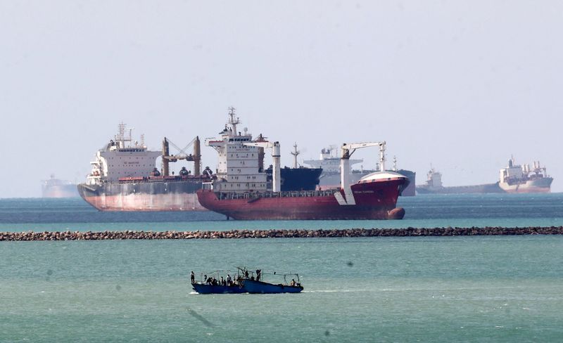 &copy; Reuters. FILE PHOTO: Ships and boats are seen at the entrance of Suez Canal, which was blocked by stranded container ship Ever Given that ran aground