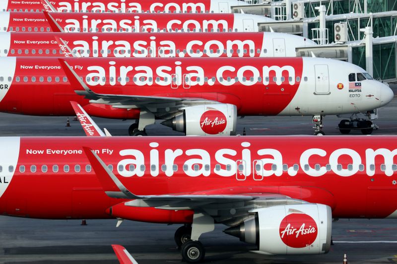 &copy; Reuters. FILE PHOTO: Airasia planes are seen parked at Kuala Lumpur International Airport 2, amid the coronavirus disease (COVID-19) outbreak in Sepang