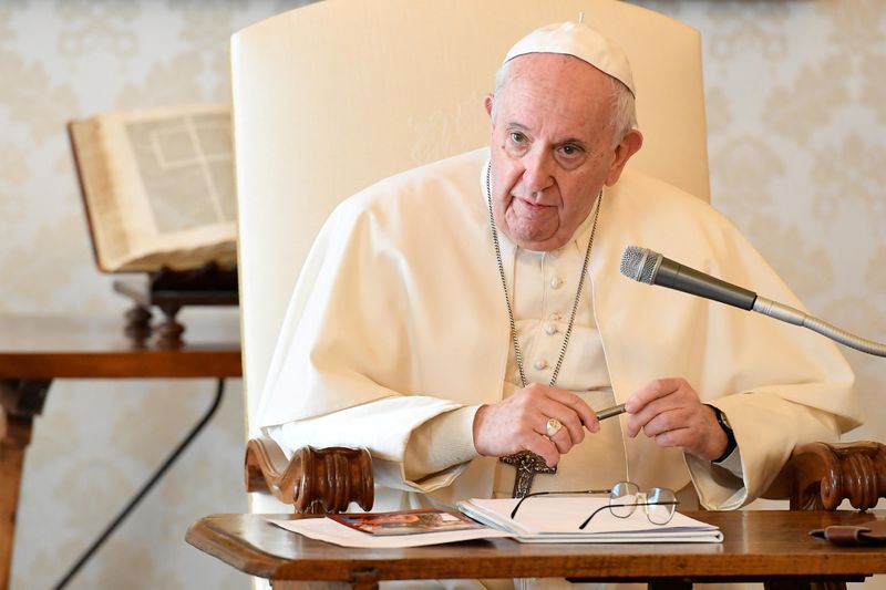 &copy; Reuters. Pope Francis receives in audience members of the Vatican COVID-19 Commission