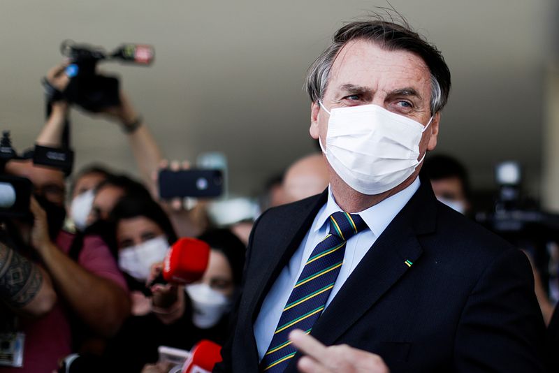 &copy; Reuters. FILE PHOTO: Brazil&apos;s President Jair Bolsonaro is seen after a meeting with Brazil&apos;s Lower House Arthur Lira at the Planalto Palace, in Brasilia