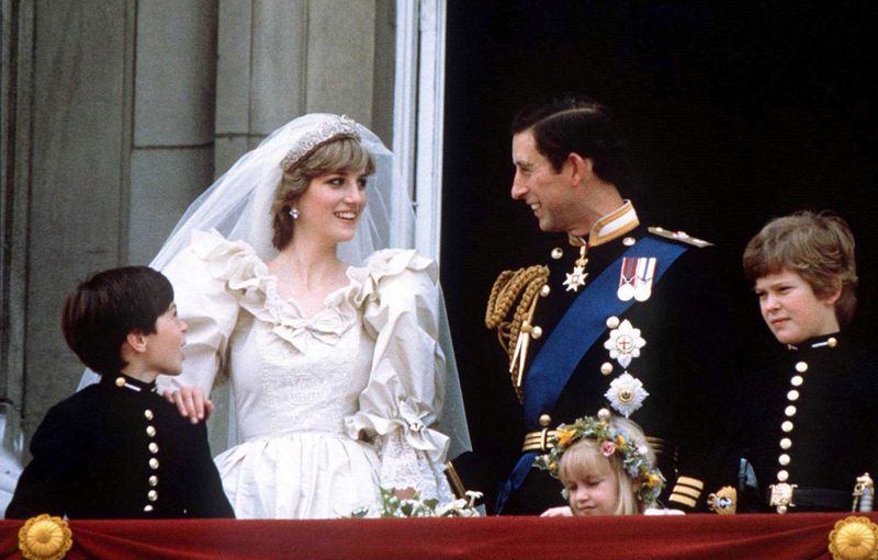 &copy; Reuters. FILE PHOTO: Prince Charles and Princess Diana stand on the balcony of Buckingham Palace following their wedding at St. Pauls Cathedral