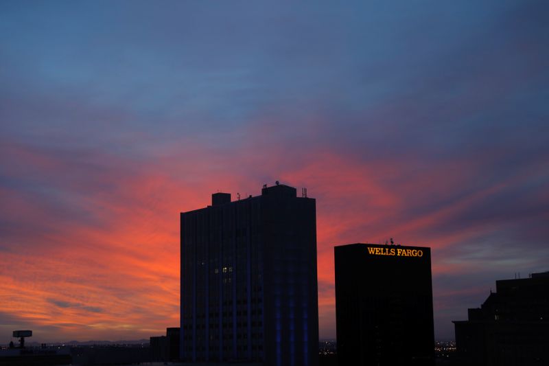 &copy; Reuters. The sun rises behind a Wells Fargo building in El Paso, Texas