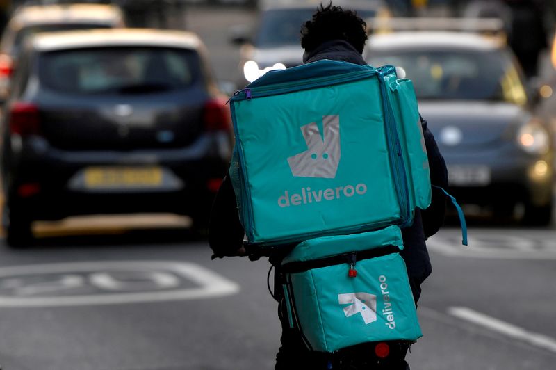 &copy; Reuters. FILE PHOTO: Deliveroo delivery rider cycles in London, Britain