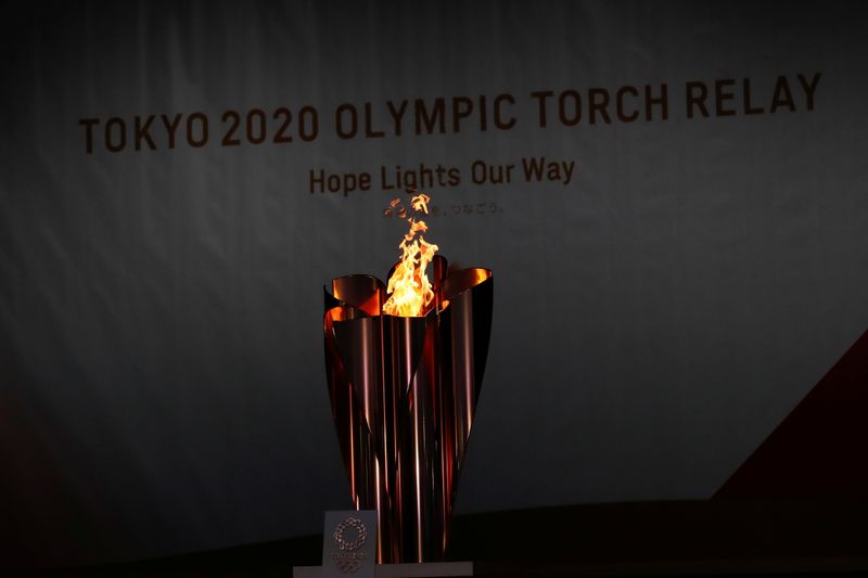 &copy; Reuters. FILE PHOTO: Tokyo 2020 Olympic torch relay