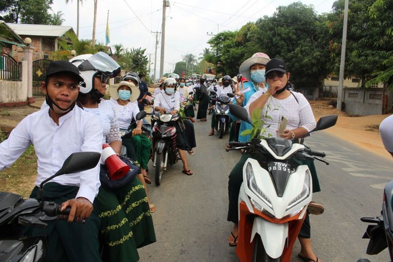 &copy; Reuters. People take part in a motorcycle parade during a protest against the military coup, in Launglon township