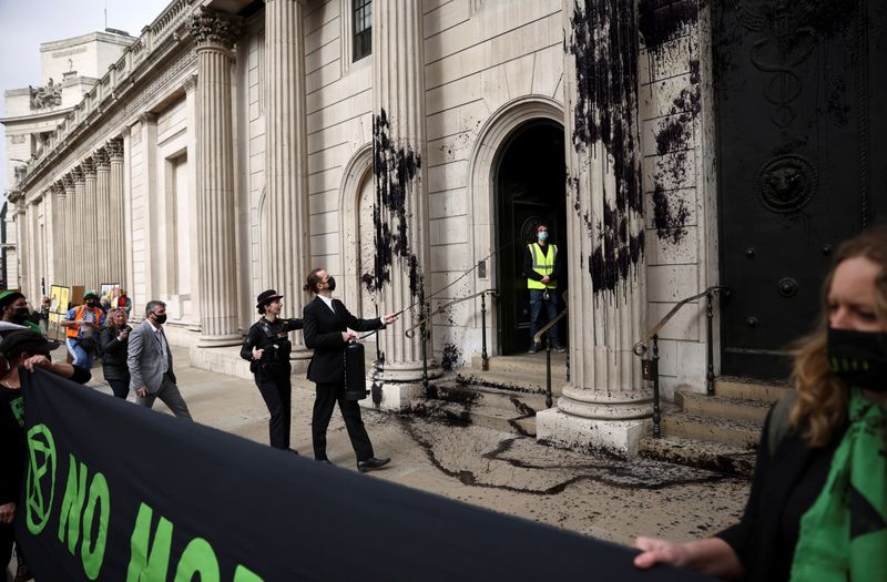 &copy; Reuters. Extinction Rebellion activists protest outside the Bank of England