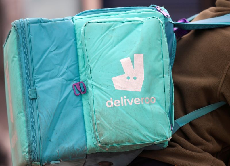 &copy; Reuters. FILE PHOTO: A Deliveroo delivery rider cycles in London