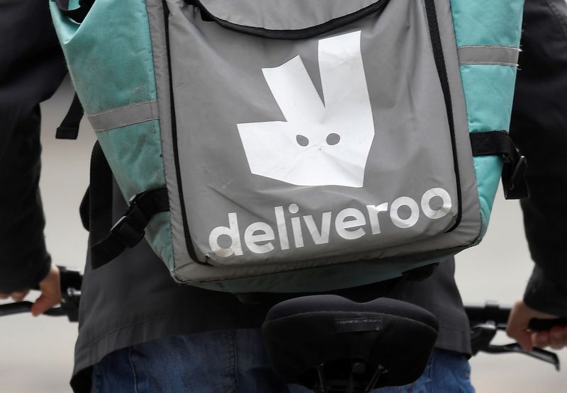 &copy; Reuters. FILE PHOTO: A Deliveroo delivery rider cycles in London, Britain