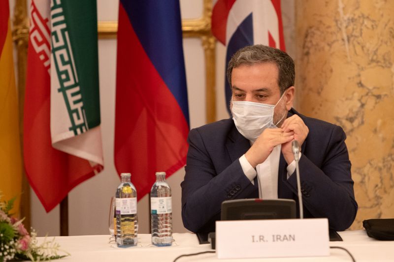 &copy; Reuters. FILE PHOTO: Iran&apos;s top nuclear negotiator Araqchi and EEAS Schmid attend a meeting in Vienna