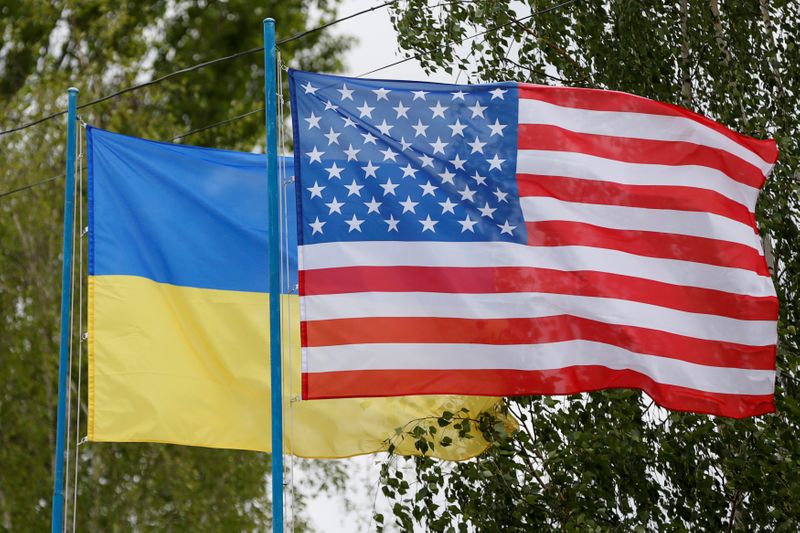 &copy; Reuters. National flags of Ukraine and U.S. fly at compound of police training base outside Kiev