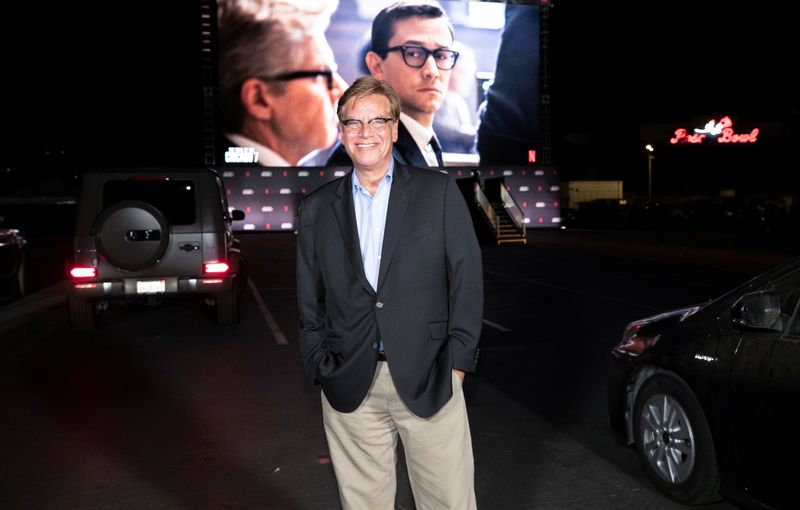 &copy; Reuters. FILE PHOTO: Director and writer of the movie Aaron Sorkin poses at a drive-in premiere for the film &quot;The Trial of the Chicago 7&quot; at Rose Bowl in Pasadena