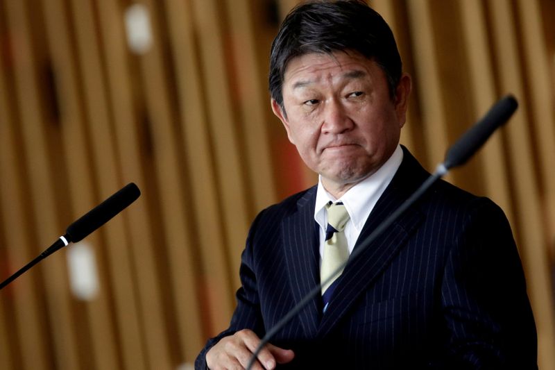 &copy; Reuters. FILE PHOTO: Japan&apos;s Foreign Minister Toshimitsu Motegi looks on during a statement to the media in Brasilia