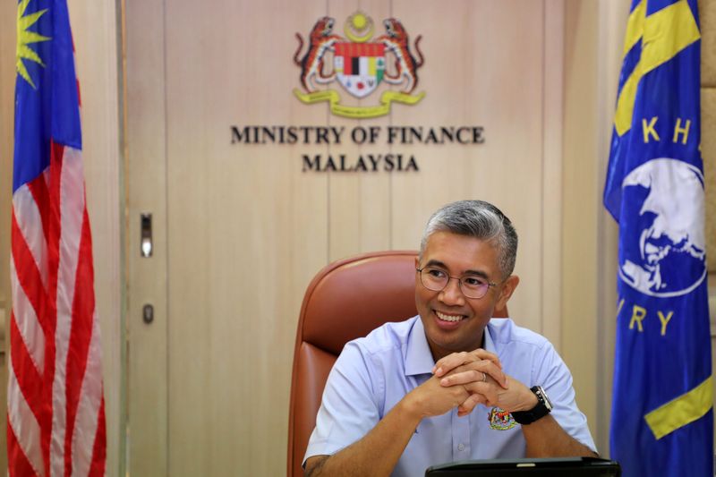 © Reuters. Malaysia's Finance Minister Tengku Zafrul reacts during an interview with Reuters in Putrajaya