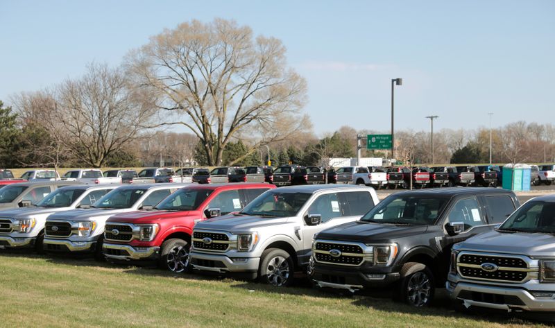 &copy; Reuters. FILE PHOTO: Newly manufactured Ford Motor Co. 2021 F-150 pick-up trucks are seen waiting for missing parts in Dearborn