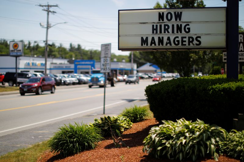 &copy; Reuters. FILE PHOTO: The sign on a Taco Bell restaurant advertises &quot;Now Hiring Managers&quot; in Fitchburg