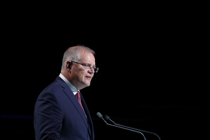 © Reuters. FILE PHOTO: Australian Prime Minister Morrison speaks during a state memorial honouring victims of the Australian bushfires in Sydney