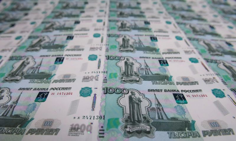 &copy; Reuters. A sheet of 1000 Russian Roubles notes is pictured at Goznak printing factory in Moscow