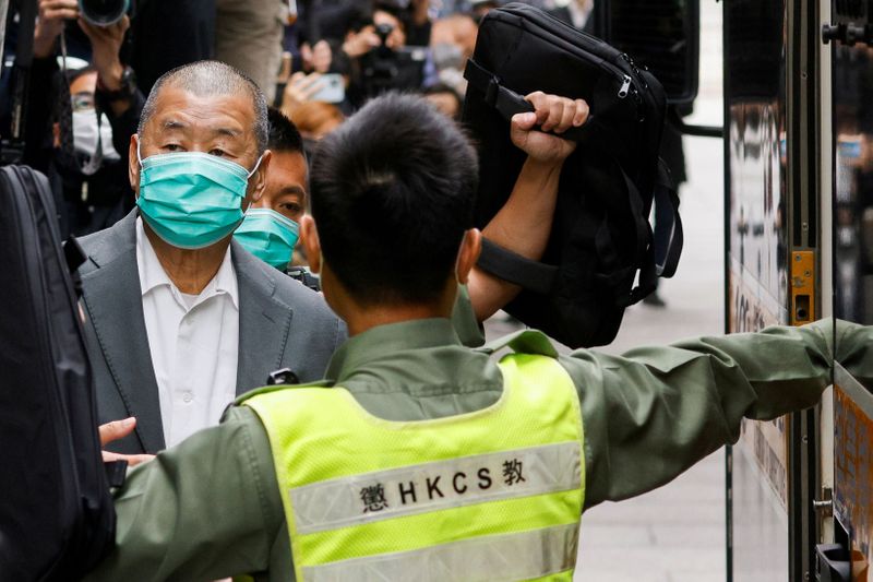 &copy; Reuters. FILE PHOTO: Media mogul Jimmy Lai, founder of Apple Daily, leaves the Court of Final Appeal by prison van in Hong Kong