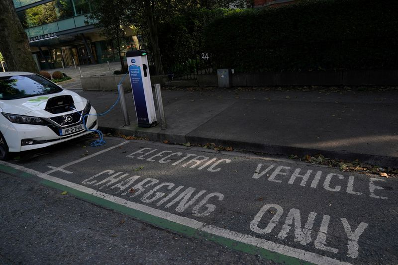 &copy; Reuters. FILE PHOTO: An ESB (Electricity Supply Board) electric vehicle charge point is seen in use in Dublin