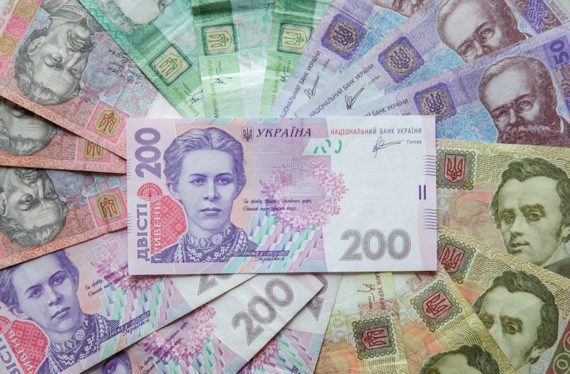 &copy; Reuters. Ukrainian hryvnia banknotes are seen in a photo illustration shot in Kiev