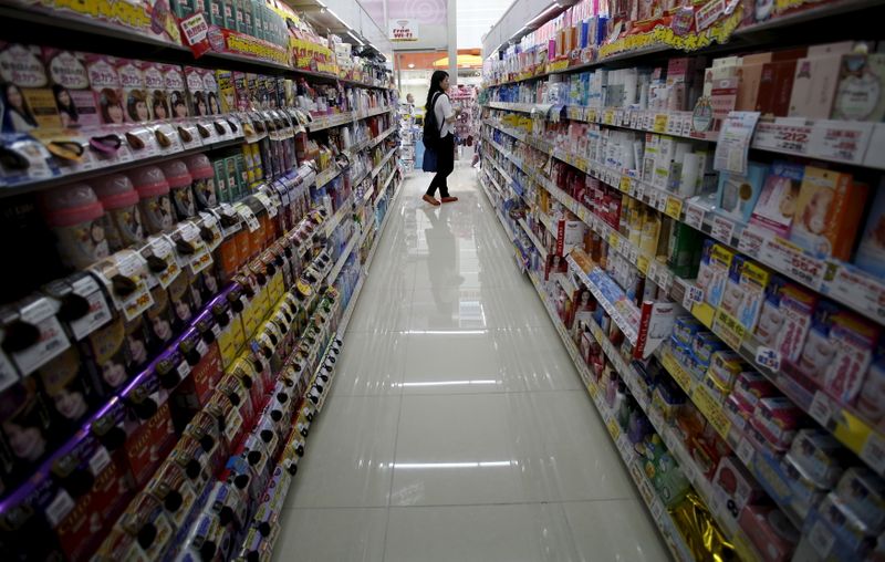 &copy; Reuters. FILE PHOTO: A shopper looks at items at a drug store in Tokyo