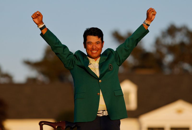 &copy; Reuters. ゴルフ＝松山がマスターズ制覇、歴史的優勝に「とてもうれしい」