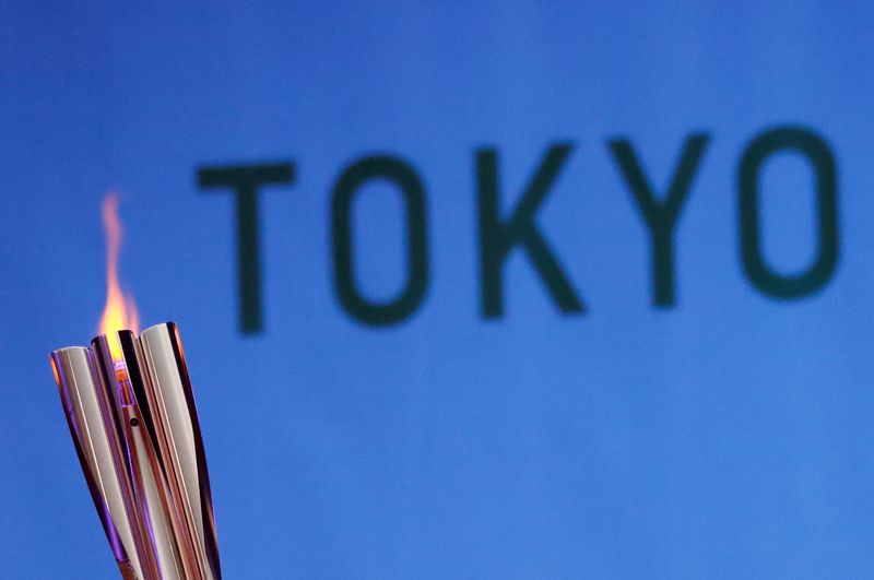 © Reuters. FILE PHOTO: Tokyo 2020 Olympic torch relay