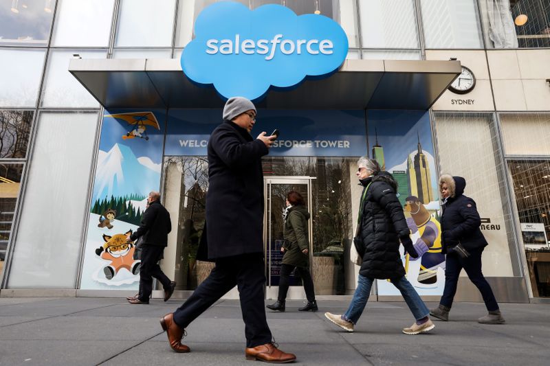 &copy; Reuters. People pass by the Salesforce Tower and Salesforce.com offices in New York