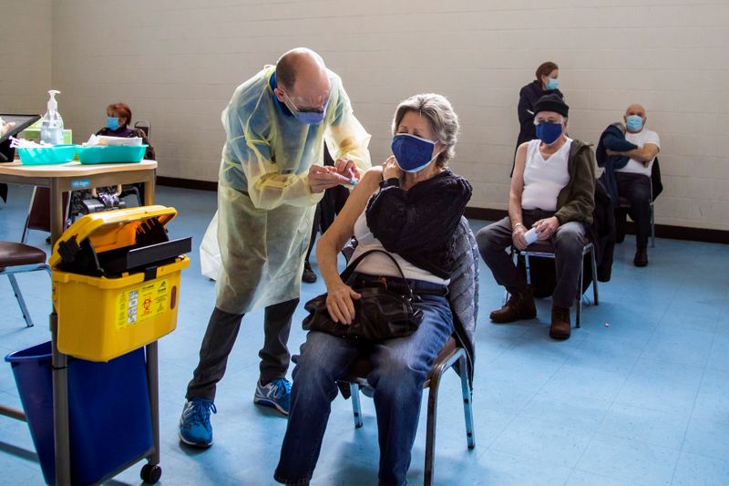 &copy; Reuters. FILE PHOTO: Vaccinations at St Fidelis Parish in Toronto